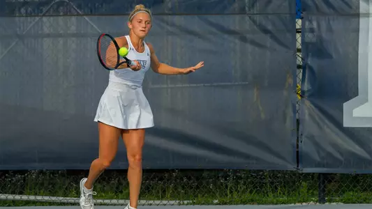 Annabelle Davis hits a forehand.