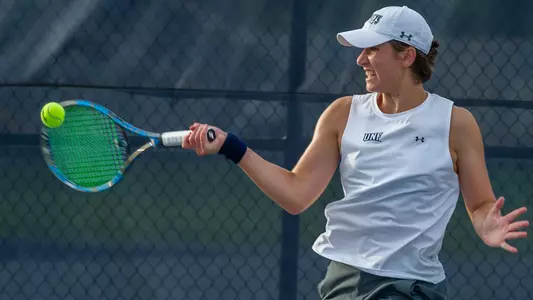 Catherine Gulihur hits a forehand.