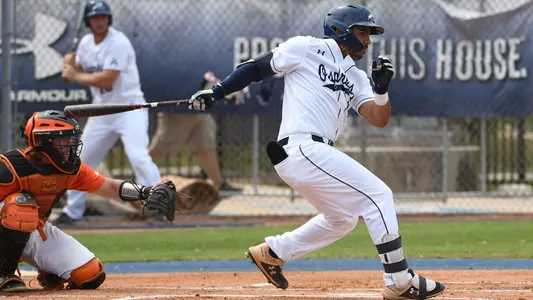 Abraham Sequera swinging at a pitch