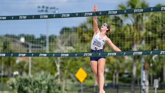 Carolyn Cain gets some air while going for the ball.