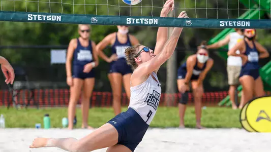Carolyn Cain makes an attack on the ball.