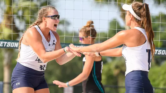 Lauren Galinis and Carleigh Semeniuk celebrate their victory.