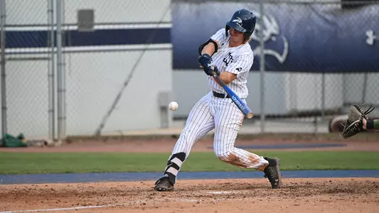 Tanner Clark swings at a pitch.