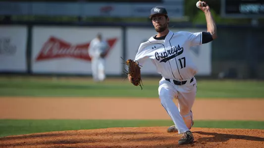 Eddie Miller makes a pitch to the plate.