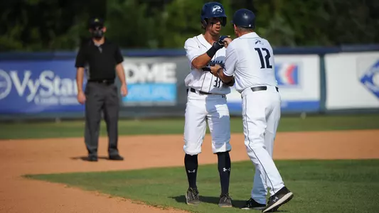 Head Coach Tim Parenton meets with Isaiah Byars