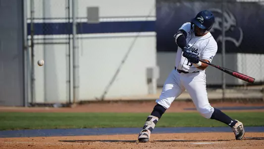 Abraham Sequera connects on a swing.
