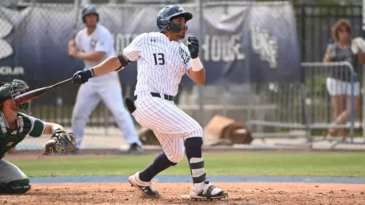Abraham Sequera follows through on a swing.