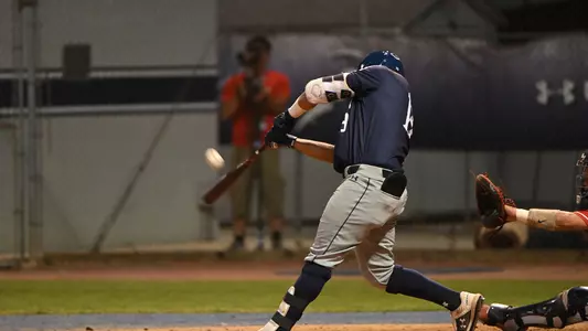 Abraham Sequera connects on a swing.