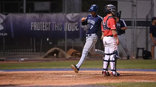 Ricky Presno crosses home plate