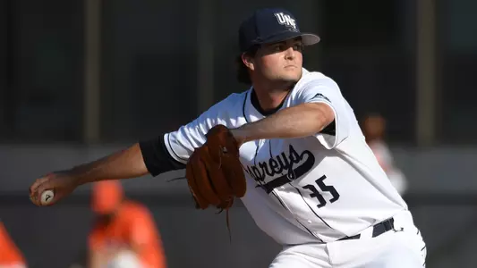 Will Ohme reaches back to deliver a pitch.