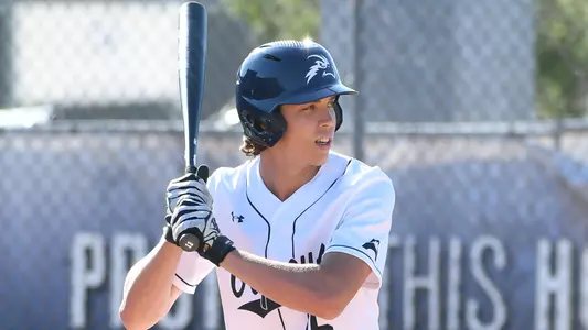 Blake Pound looks on at the plate.