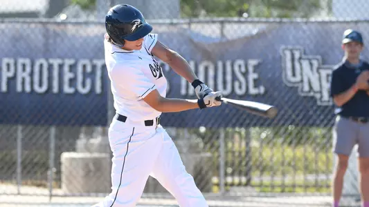 Blake Pound swings at a pitch.