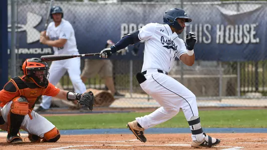 Abraham Sequera swings at a pitch.