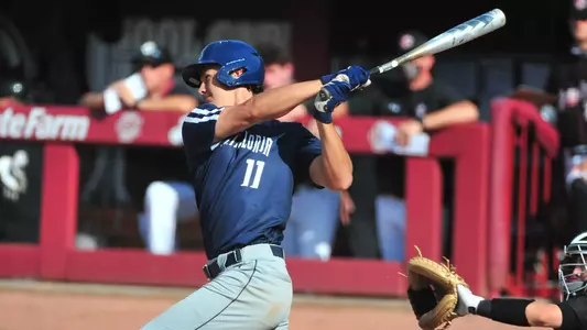 Blake Marabell making contact with a pitch.