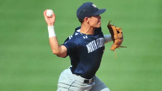 Aidan Sweatt throwing across the infield