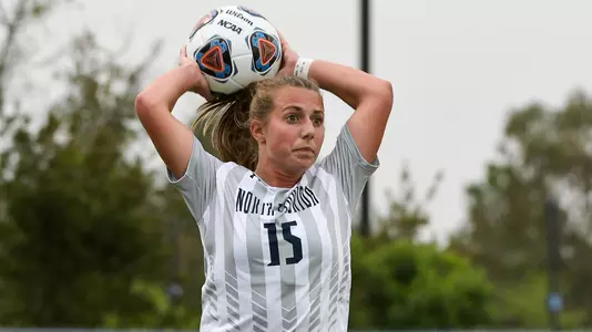 Marissa House throws the ball in from the sideline