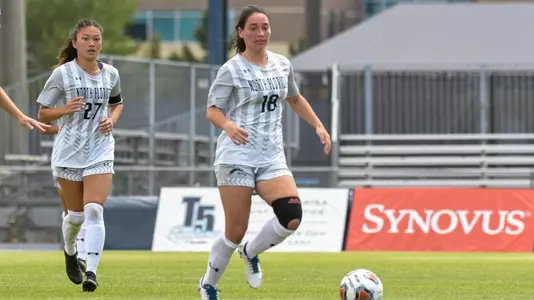 Mykayla Bond tracks down a loose soccer ball