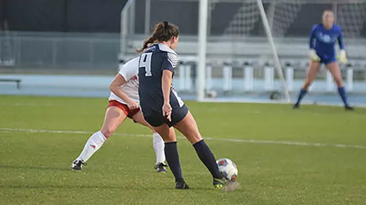 Averi Walraven shoots a ball at the goal