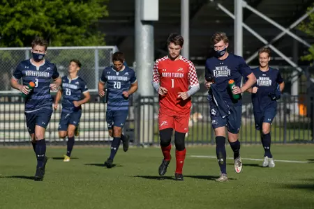 UNF soccer team heading onto the field
