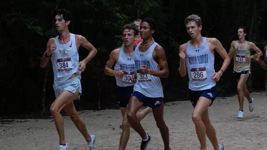 Men's XC team running of multiple XC runners for UNF