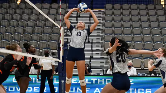 Annie Antar sets the ball