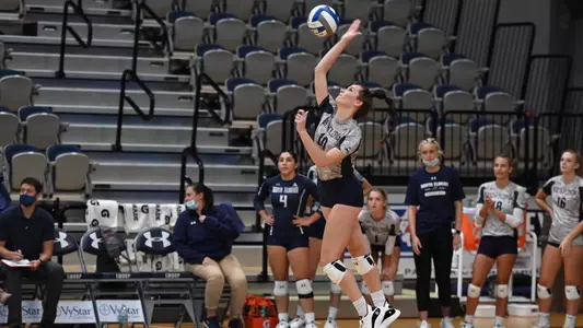 Grace Youngblood serves the ball