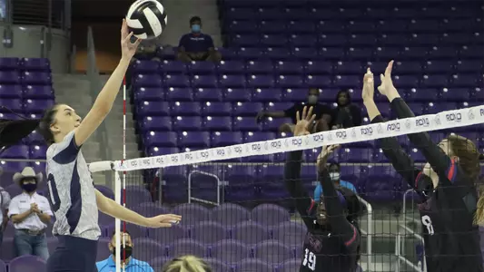 Maddie Boyd makes an attack on the ball