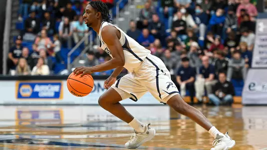 Jarius Hicklen dribbles to the hoop