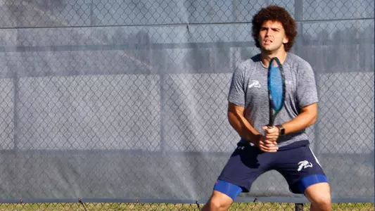 Rodrigo getting ready to return a serve