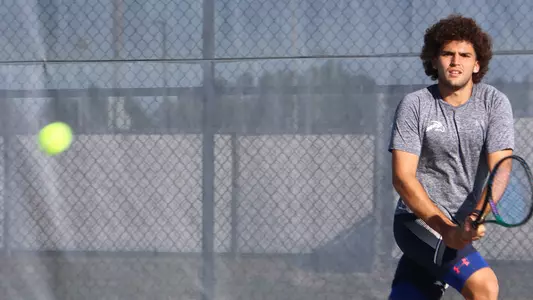 rodrigo getting ready to hit a backhand