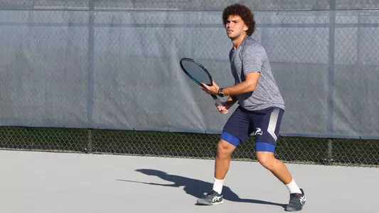 rodrigo getting ready to hit a forehand