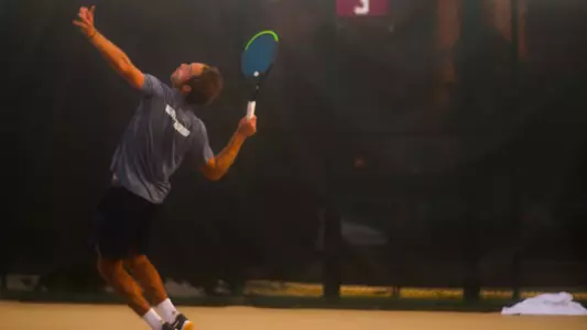 Nilo in the middle of his serve