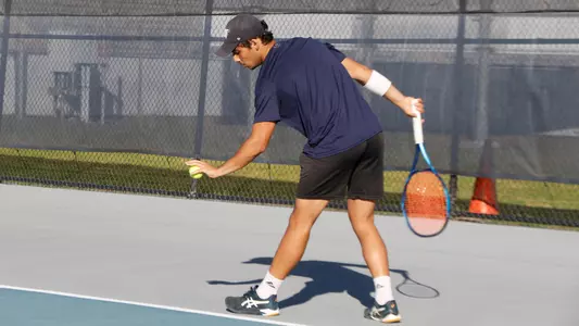 Breno getting ready to serve