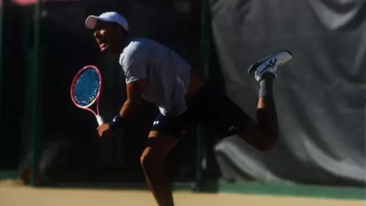 Jorge after hitting a serve