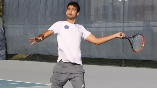 breno hitting a forehand swinging volley