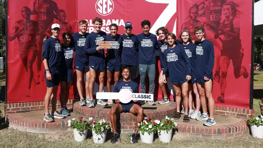Men's XC team posing for runner-up award