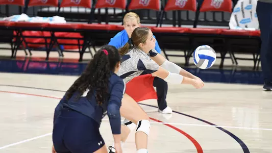 Maymie Guthrie going for a dig