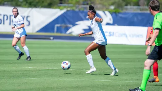 Allyna Thurston kicking the ball