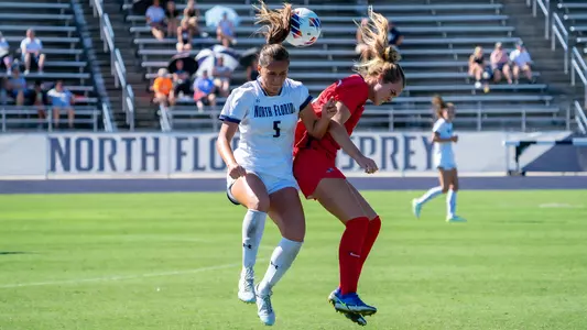 Mia Sadler going up for a header