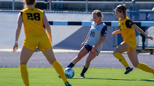 Amanda Hartmann kicking the ball