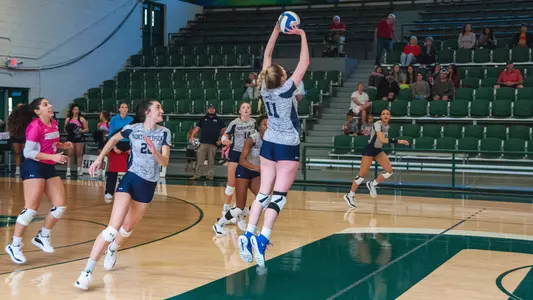 Savannah Cook making a set on the ball