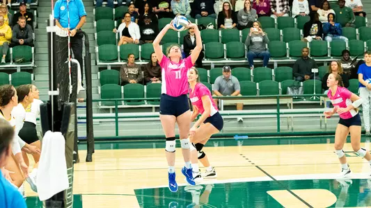 Savannah Cook setting the ball