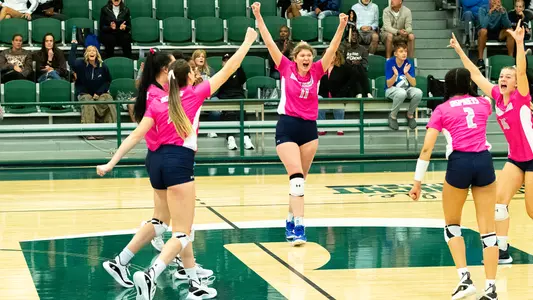 UNF volleyball team celebration at Jacksonville University against Kennesaw State