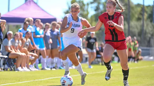 Masen Fry dribbling up the field
