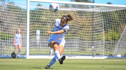 Zara Siassi kicking the ball off her right foot