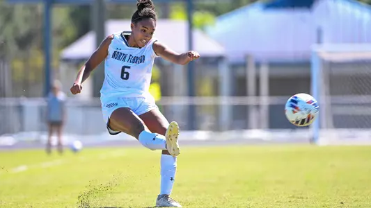 Allyna Thurston kicking the ball