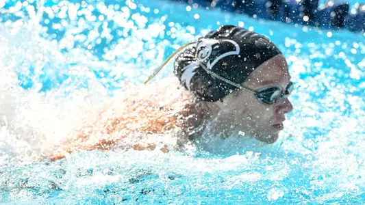 Ashley Cozad swimming through the water
