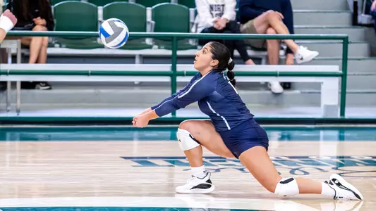 Rocio Moro going for the ball to dig it out