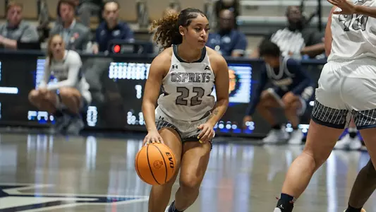 Lyric Swann dribbling around screen