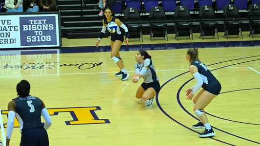 UNF volleyball photo of Rocio digging a ball out